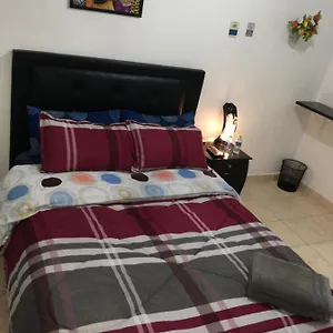 Dorado Airport Rooms&apartments Habitación en casa particular